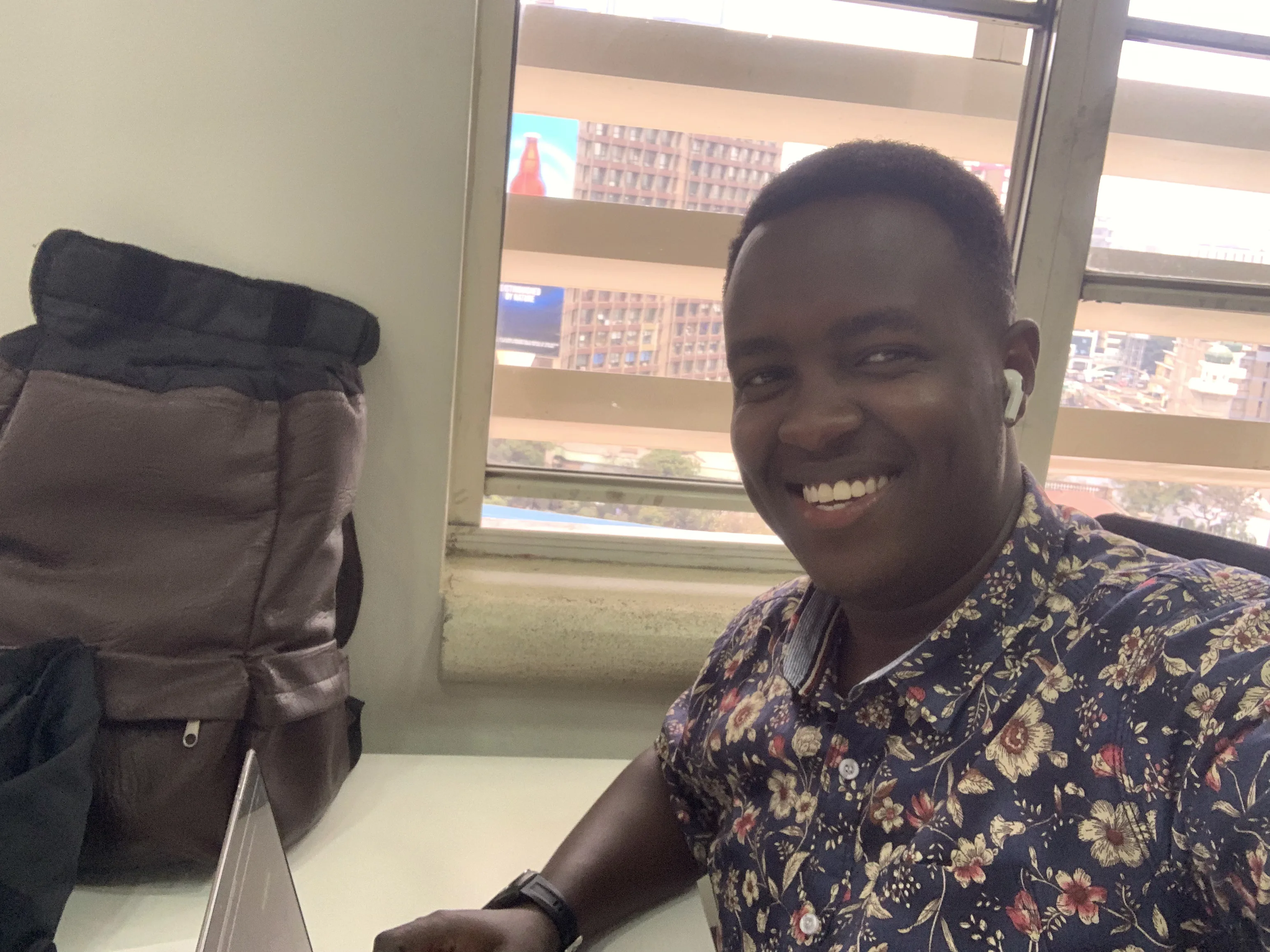 Wahome Maina working from an office in Nairobi